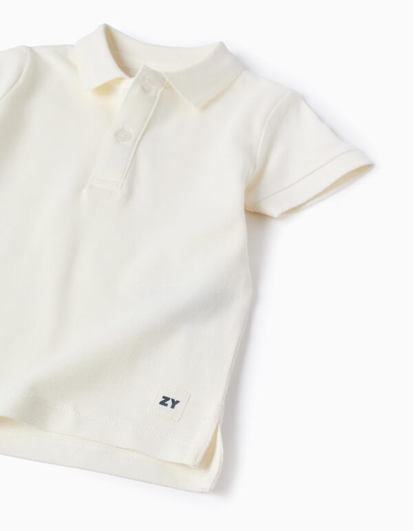 Polo bebé blanco roto